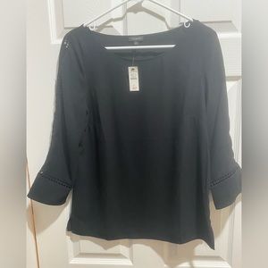 Talbots 3/4 sleeve blouse with tags on. Never worn.